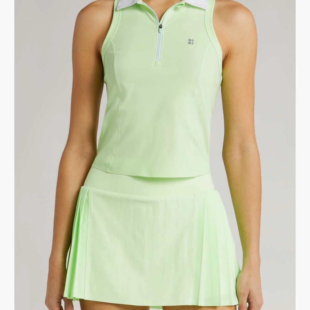 Sweaty Betty Vibrant Green skort and matching top, both size M